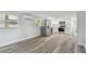 Open-concept kitchen features updated appliances and flooring at 850 Center Ave, Brandon, FL 33511