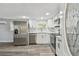 Updated kitchen features stainless steel appliances and new flooring at 850 Center Ave, Brandon, FL 33511