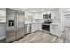 Modern kitchen with stainless steel appliances and stylish cabinets at 850 Center Ave, Brandon, FL 33511
