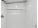 A recently renovated shower stall features modern tile and a recessed shelf at 850 Center Ave, Brandon, FL 33511