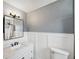 Updated bathroom features stylish vanity with marble countertop and modern fixtures at 9010 Bonnet Way, Weeki Wachee, FL 34613