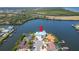 Waterfront property on a point lot with lush landscaping and easy ocean access at 935 Chipaway Dr, Apollo Beach, FL 33572