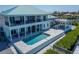 Backyard with private pool and outdoor living space at 935 Chipaway Dr, Apollo Beach, FL 33572
