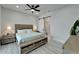 Bedroom with stylish furnishings and ensuite bathroom at 935 Chipaway Dr, Apollo Beach, FL 33572