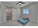 Bedroom with an ensuite bathroom with modern finishes and bright natural light at 935 Chipaway Dr, Apollo Beach, FL 33572