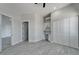 Bright bedroom with tile floors and a stylish built-in desk/cabinet space at 935 Chipaway Dr, Apollo Beach, FL 33572