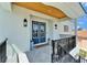 Charming front entrance features blue double doors, stylish lighting, and a welcoming walkway with black railings at 935 Chipaway Dr, Apollo Beach, FL 33572