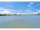 A tranquil open water view showcases the beauty of the waterfront property and its serene surroundings at 935 Chipaway Dr, Apollo Beach, FL 33572