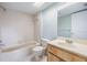 Bathroom with a tub, shower, toilet and vanity at 9851 113Th St # 206, Seminole, FL 33772