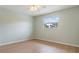 Cozy bedroom with wood floors and a window at 9851 113Th St # 206, Seminole, FL 33772