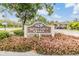 Welcoming 'Seminole Oaks' sign amidst lush landscaping, marking the entrance to the community at 9851 113Th St # 206, Seminole, FL 33772