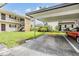 Complex with grass and landscaping plus covered parking for unit 206 at 9851 113Th St # 206, Seminole, FL 33772