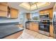 Modern kitchen with stainless steel appliances and ample counter space at 9851 113Th St # 206, Seminole, FL 33772