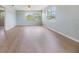 Open concept living area with lots of natural light and wood floors at 9851 113Th St # 206, Seminole, FL 33772