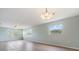 Bright living room with wood floors, ceiling fan, and multiple windows at 9851 113Th St # 206, Seminole, FL 33772