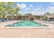 Clean rectangular pool surrounded by a brick paver deck in a quiet neighborhood at 9851 113Th St # 206, Seminole, FL 33772