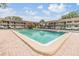 Clean rectangular pool with a brick paver deck in a quiet residential neighborhood at 9851 113Th St # 206, Seminole, FL 33772