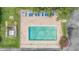 Clean rectangular pool with brick paver deck, pool furniture and surrounding landscaping at 9851 113Th St # 206, Seminole, FL 33772