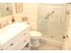 Bright bathroom featuring a glass-enclosed shower and contemporary vanity for a spa-like experience at 9950 47Th N Ave # 311, St Petersburg, FL 33708