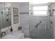 Updated bathroom with modern fixtures, offering a clean and stylish design at 9950 47Th N Ave # 311, St Petersburg, FL 33708