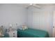 Cozy bedroom featuring two twin beds, offering a comfortable and inviting space at 9950 47Th N Ave # 311, St Petersburg, FL 33708