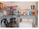 Organized laundry room with washer, shelving, and ample storage space for supplies and cleaning equipment at 9950 47Th N Ave # 311, St Petersburg, FL 33708