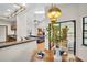 Inviting dining area with views of the kitchen, living room, and outdoor patio at 10 Greenhaven Cir, Oldsmar, FL 34677