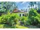Charming single-story home surrounded by lush greenery at 10 Greenhaven Cir, Oldsmar, FL 34677