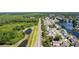 An aerial shot showcasing the neighborhood's proximity to green space and a scenic pond at 10918 Lake Andover Blvd, Tampa, FL 33624