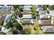 Aerial view of a residential neighborhood, featuring fenced yards and mature trees at 10918 Lake Andover Blvd, Tampa, FL 33624