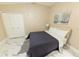Inviting bedroom with a closet and art, perfect for rest and relaxation at 10918 Lake Andover Blvd, Tampa, FL 33624