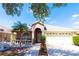 Charming single Gathering home featuring a well-manicured lawn and two-car garage at 10918 Lake Andover Blvd, Tampa, FL 33624