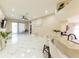 Spacious living area with bar seating and an open view to the patio at 10918 Lake Andover Blvd, Tampa, FL 33624