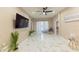 Bright living room features modern decor, stylish floors, and a relaxing rocking chair at 10918 Lake Andover Blvd, Tampa, FL 33624