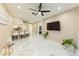 Bright, open living area with a breakfast bar connecting the kitchen at 10918 Lake Andover Blvd, Tampa, FL 33624