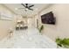 Bright living room with bar seating and marble floors at 10918 Lake Andover Blvd, Tampa, FL 33624