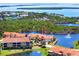 Gorgeous waterfront townhomes nestled in a community with scenic water views and terracotta tile roofs at 11 Franklin S Ct # C, St Petersburg, FL 33711