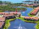 Beautiful waterfront townhome in a desirable community with lush landscaping and serene lake views at 11 Franklin S Ct # C, St Petersburg, FL 33711