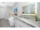 Contemporary bathroom with sleek vanity and standalone tub at 11 Franklin S Ct # C, St Petersburg, FL 33711