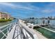 Community boat dock with boat slips, storage and direct access to the open water at 11 Franklin S Ct # C, St Petersburg, FL 33711
