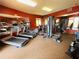 Community gym featuring modern equipment, mirrors, and plenty of space for a great workout at 11 Franklin S Ct # C, St Petersburg, FL 33711