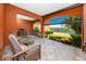 Inviting covered patio with tiled flooring and peaceful water views at 11 Franklin S Ct # C, St Petersburg, FL 33711