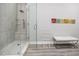 Modern bathroom with a glass-enclosed shower featuring a built-in bench at 11 Franklin S Ct # C, St Petersburg, FL 33711