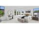 Spacious main bedroom with a seating area, neutral colors, and great natural light from many large windows at 114 W Plymouth St, Tampa, FL 33603