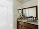 Bathroom featuring a modern vanity, granite countertop, and a shower-tub combination at 11802 Foxrun Ln, Temple Terrace, FL 33617