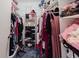 Well-organized walk-in closet with shelves and hanging space for clothing and accessories at 11802 Foxrun Ln, Temple Terrace, FL 33617