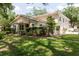 Charming townhome with a well-kept lawn and an attached two-car garage at 11802 Foxrun Ln, Temple Terrace, FL 33617