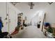 Spacious garage featuring a door to the outside, washer and dryer, and plenty of storage at 11802 Foxrun Ln, Temple Terrace, FL 33617