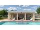 Relaxing poolside cabana offering shaded seating, tables, and a great spot for enjoying poolside activities at 11802 Foxrun Ln, Temple Terrace, FL 33617