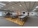 Large community room with flexible seating arrangements, offering ample space for gatherings and activities at 1235 S Highland Ave # 2-207, Clearwater, FL 33756